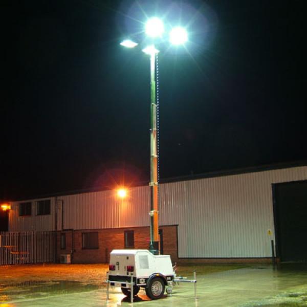 Portable diesel light tower operating at night